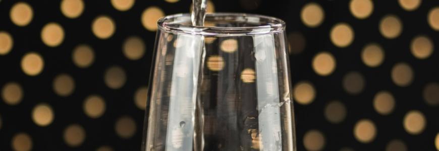 close-up-champagne-bottle-pouring-glass.jpg